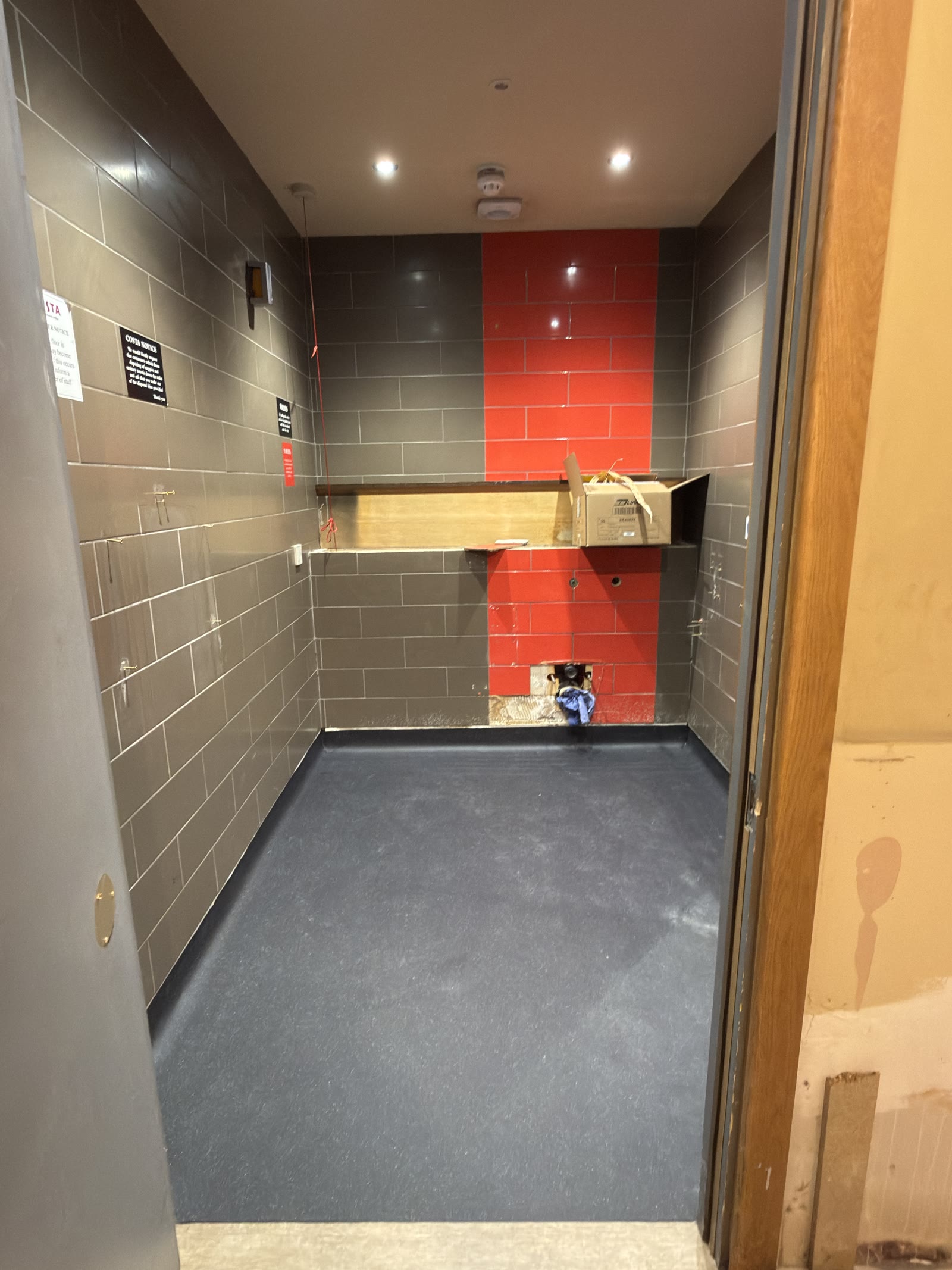 Finished dark resilient flooring detail at Costa Coffee