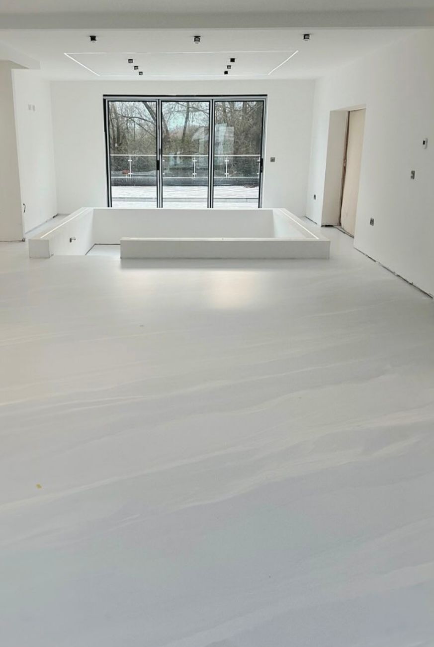 High-gloss pearl Auto Comfort resin floor in a contemporary living room